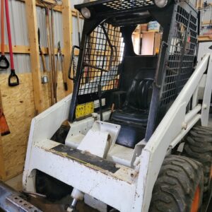 Bobcat 743 Skid Loader with bucket and forks for sale